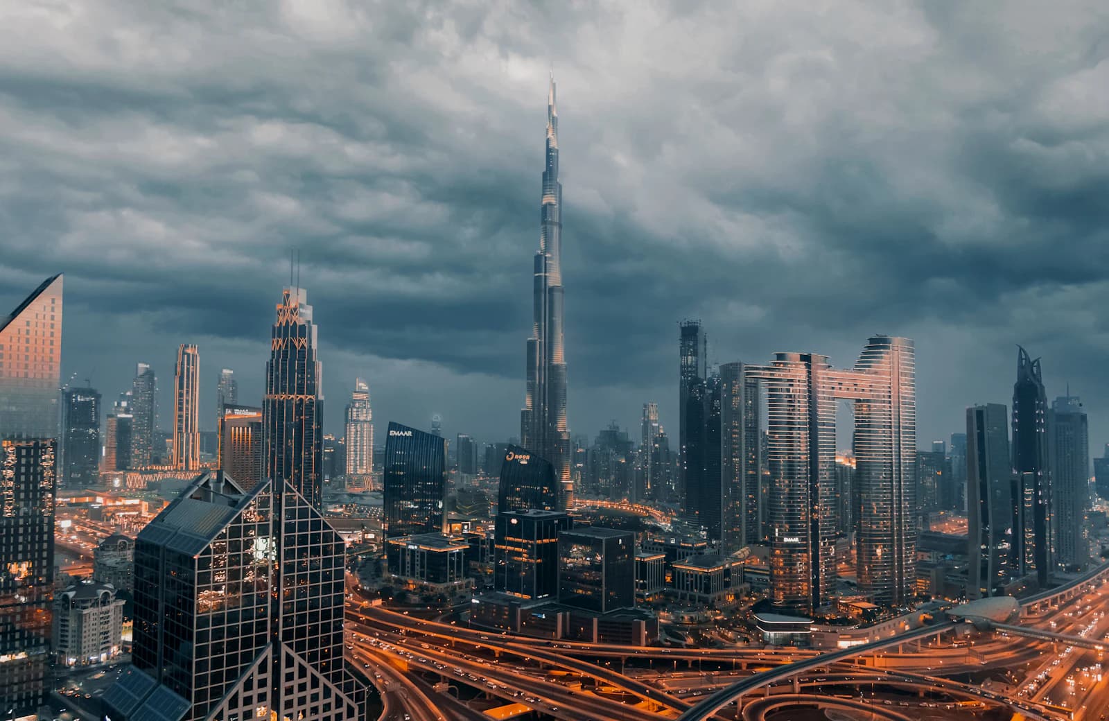 Downtown Dubai skyline under dramatic clouds